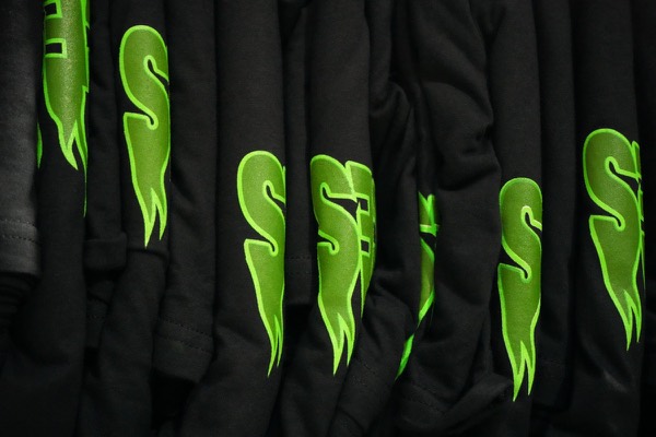 Stack of freshly printed custom t-shirts